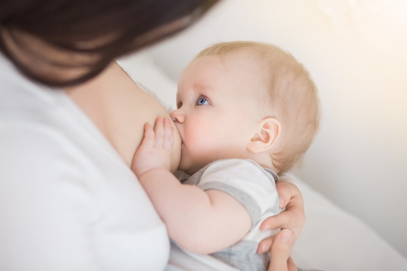 Mother breastfeeding baby