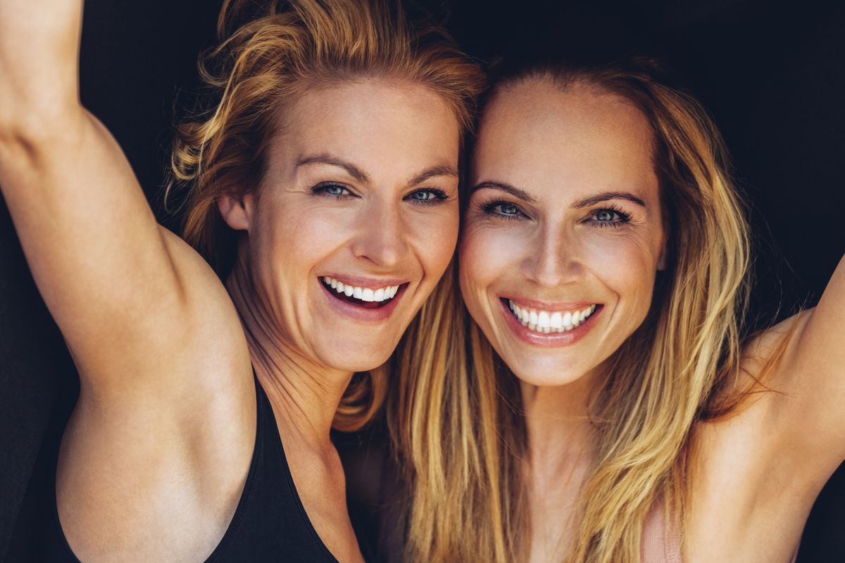 portrait-of-two-smiling-blond-women-royalty-free-image-1657742344