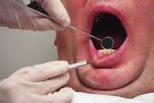 But people at risk of gum disease need more frequent appointments, researcher says.