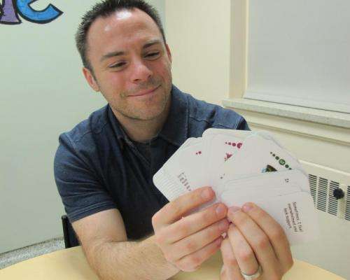 UAlberta researcher Geoff Ball demonstrates CONversation Cards. Credit: Faculty of Medicine & Dentistry, University of Alberta