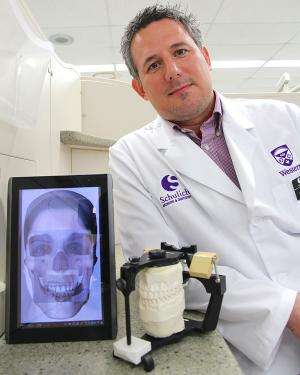 Schulich School of Medicine & Dentistry professor Les Kalman hopes his latest invention, a Virtual Facebow app, will not only assist dentists with diagnosis and treatment, but act as a valuable teaching tool for students. Credit: Paul Mayne, Western News