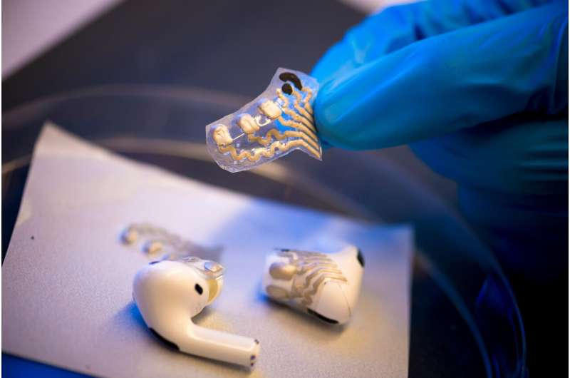 Screen-printed, flexible sensors allow earbuds to record brain activity and exercise levels