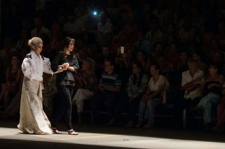 An Alzheimer sufferer models a creation by designer Guio Di Colombia during the Walkway Inclusion fashion show in Colombia last 