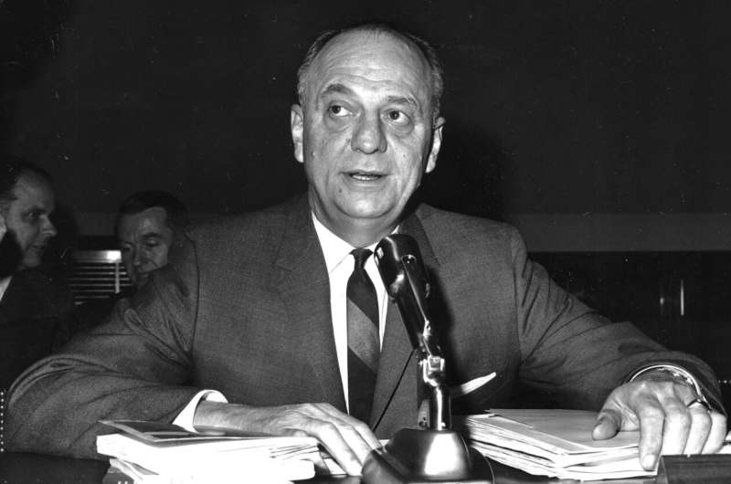 In this April 9, 1965 file photo, Surgeon General Luther Terry testifies on Capitol Hill in Washington before the House Commerce Committee hearing on proposed labeling of cigarette packages. Sixty years ago, the U.S. surgeon general released a report that settled a longstanding public debate about the dangers of cigarettes and led to huge changes in smoking in America. Some public health experts say a similar report could help clear the air about vaping. Credit: AP Photo/File