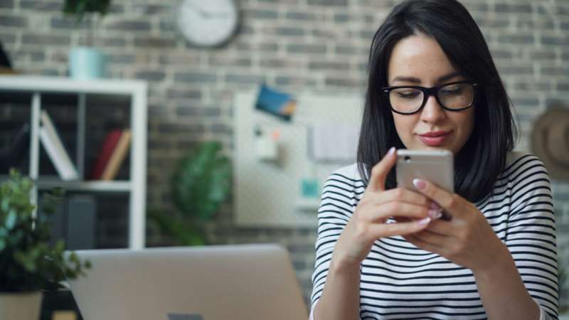 woman using smartphone