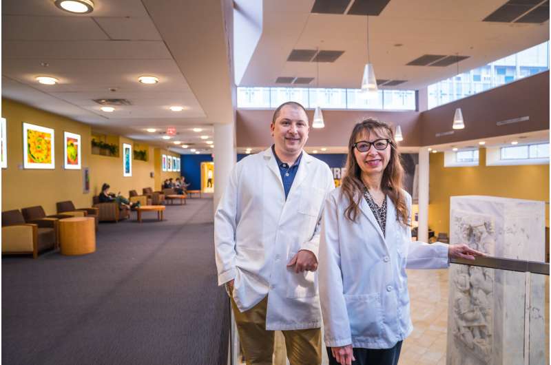 Christopher Waters, research labs director, and R. Constance Wiener, assistant professor, both of the WVU School of Dentistry, Department of Dental Research. Credit: Aira Burkhart/West Virginia University