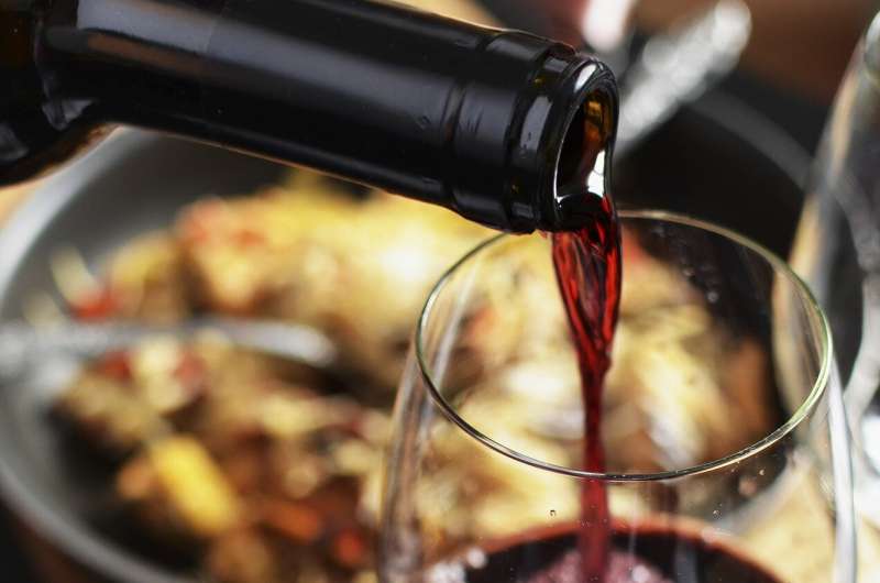 Why does even a small amount of red wine give some people headaches?