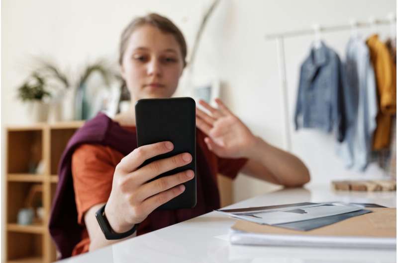 adolescent on phone