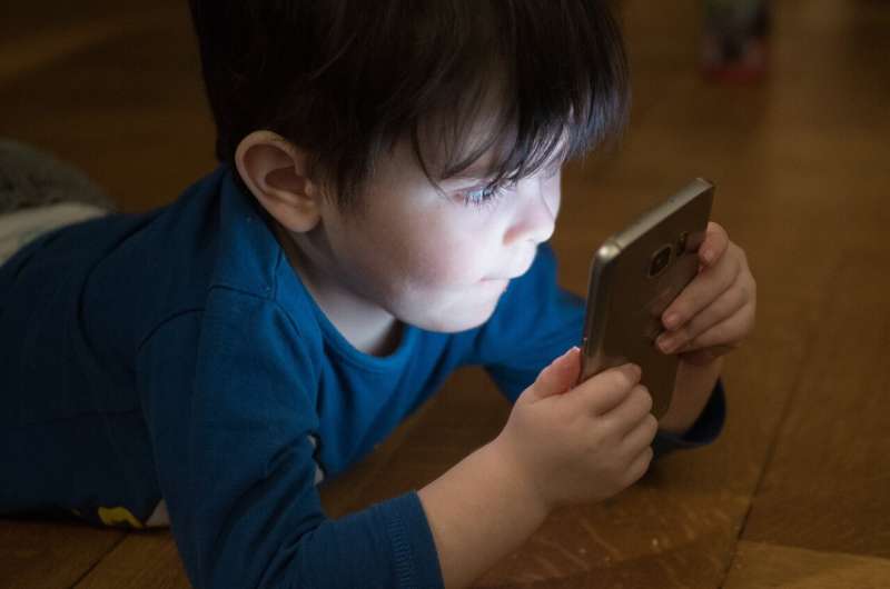 Kids in families with too much screen time struggle with language skills, study suggests